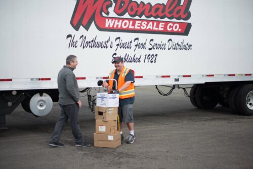 Man Delivering for Mcdonald Wholesale