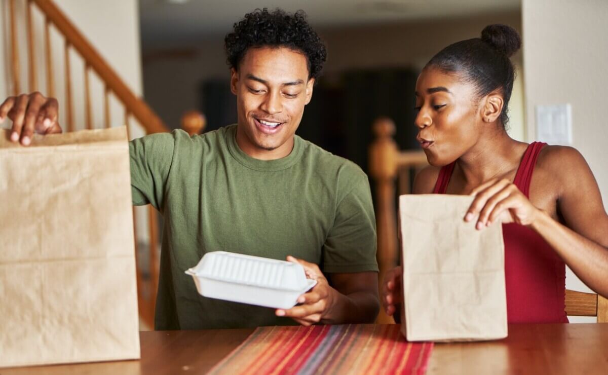 Couple Opening Takeout Order